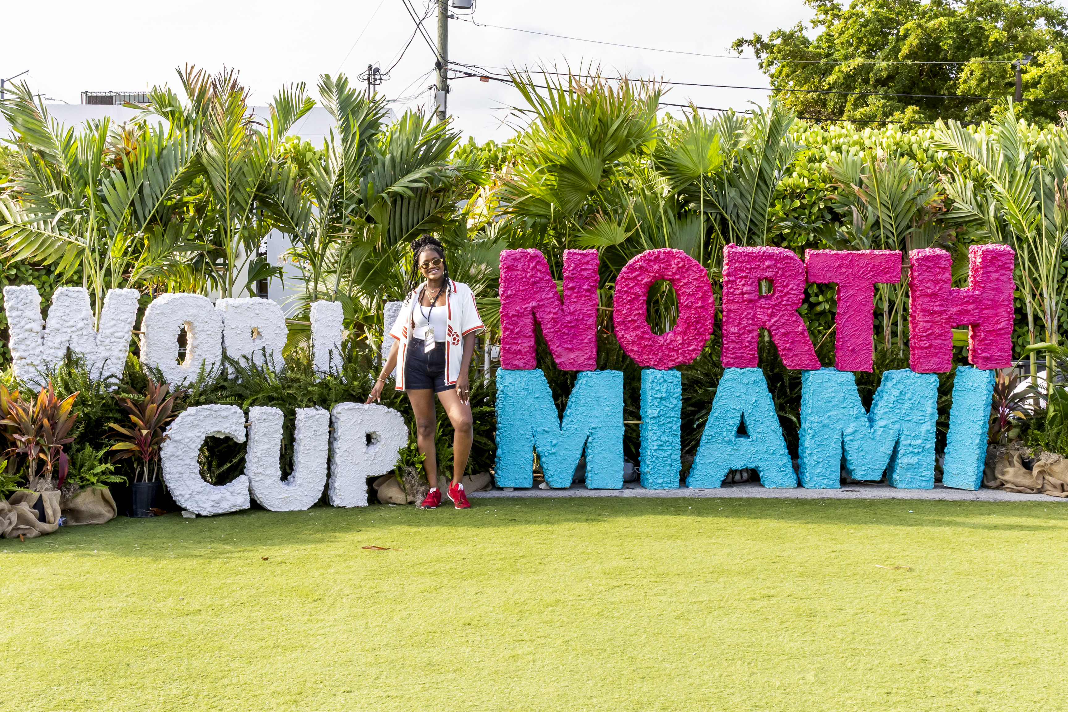 Kai Green at the North Miami sign